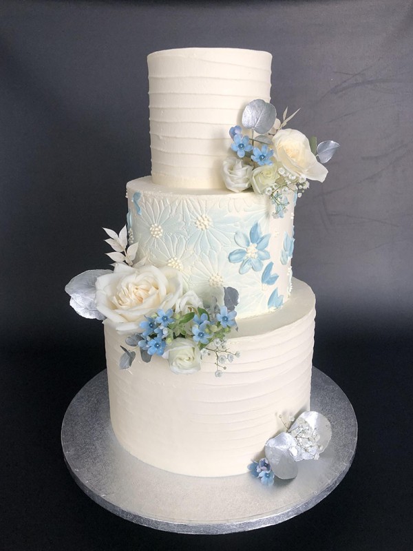 Textured blue and white wedding cake