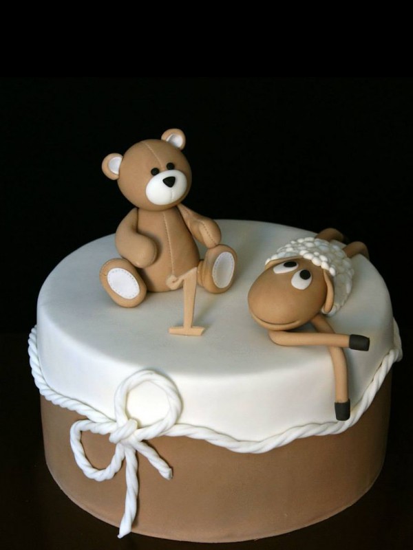 Birthday cake with teddy bear and sheep