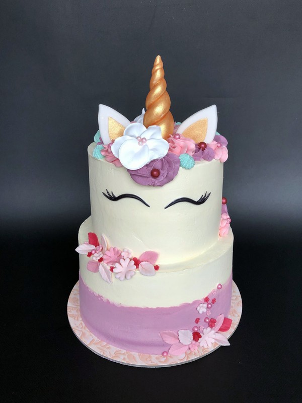 Two tier unicorn birthday cake