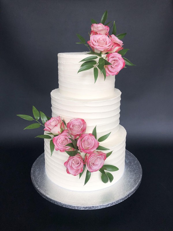 Wedding cake with pink roses