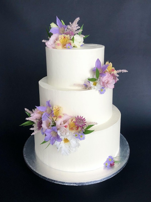 Wedding cake with summer flowers